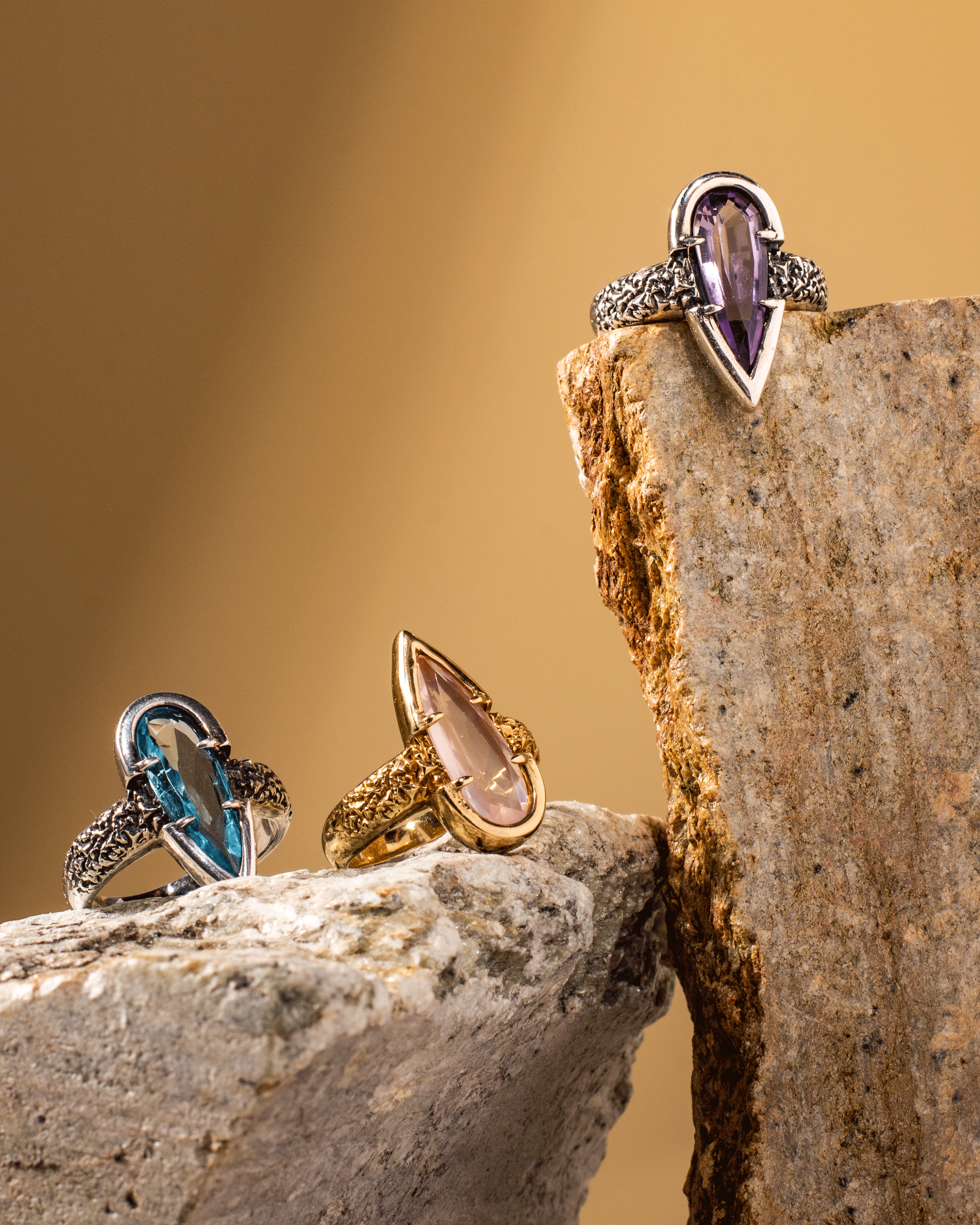 Two custom engagement rings and one handcrafted ring in Philadelphia at Angela Monaco Jewelry