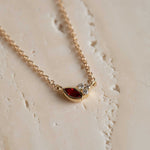 Angela Monaco Jewelry Philadelphia 14k yellow gold garnet marquis diamond cluster necklace