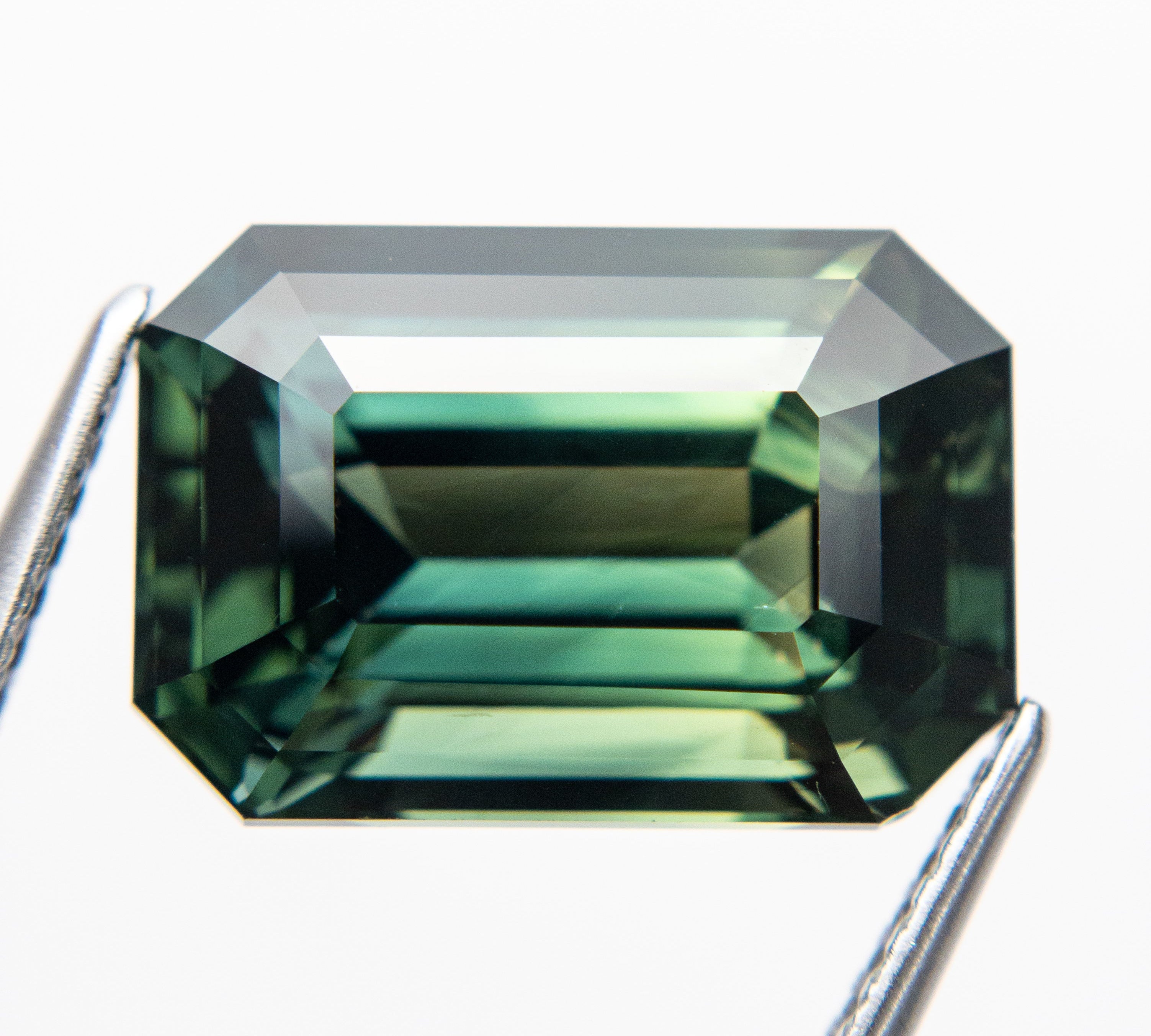 10.60ct 14.13x9.70x7.56mm Cut Corner Rectangle Step Cut Sapphire 18972-01 - Misfit Diamonds