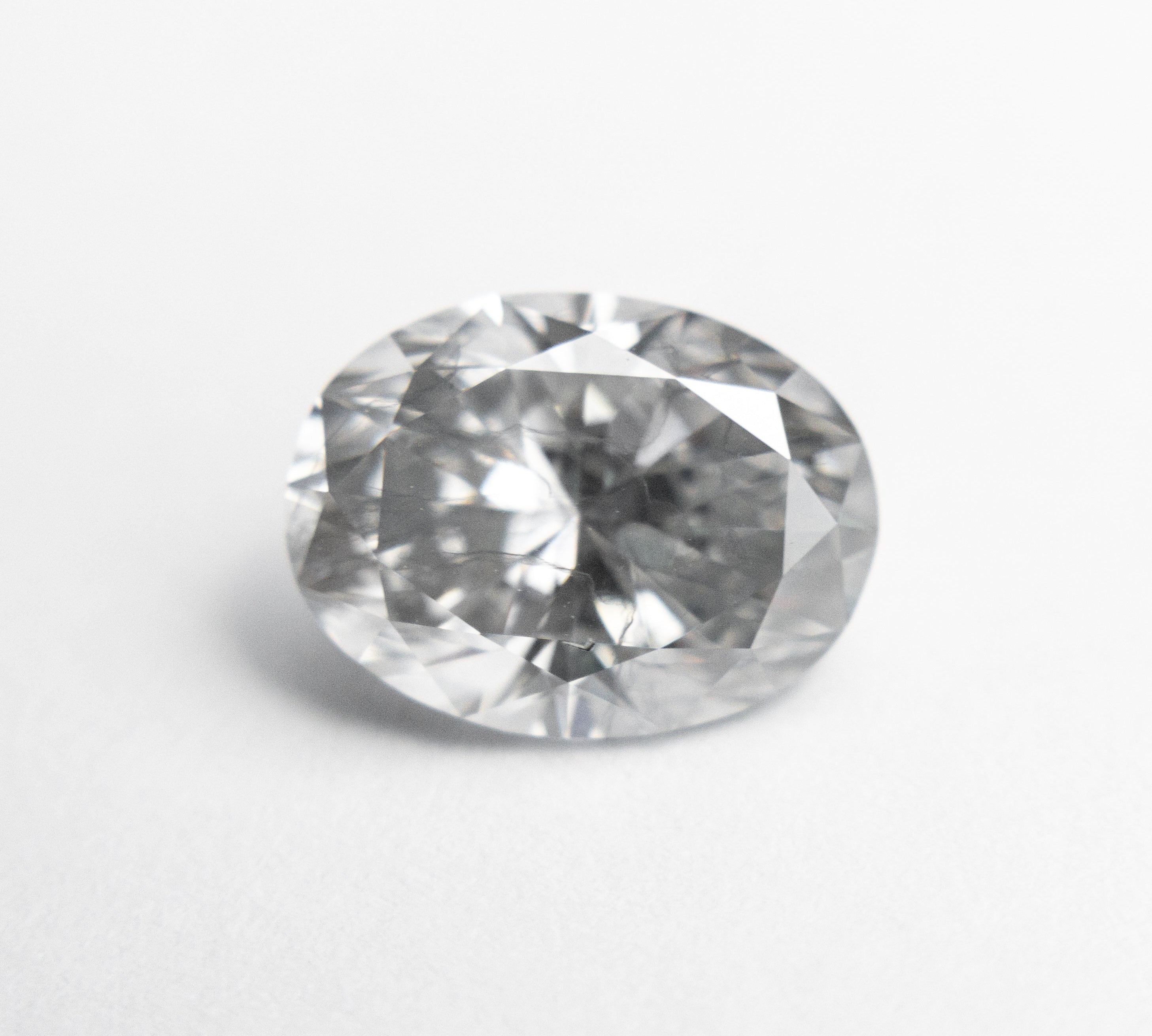 2.04ct 9.31x7.00x4.66mm GIA Fancy Light Grey Oval Brilliant 18981-01 - Misfit Diamonds