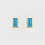 BEZEL SET SWISS BLUE TOPAZ BAGUETTE STUDS | 14K