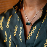 East west necklace on Male model's neck