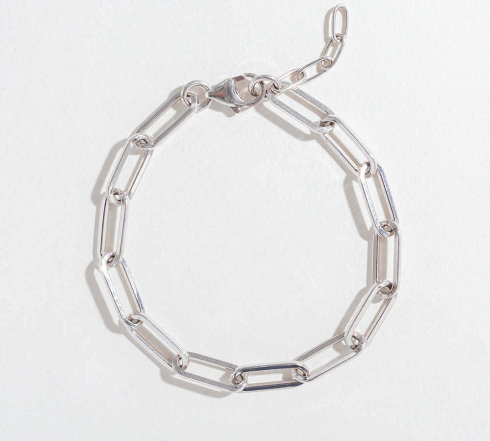 Paperclip bracelet in sterling silver on white background