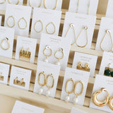GOLD LONG OVAL HOOP EARRINGS