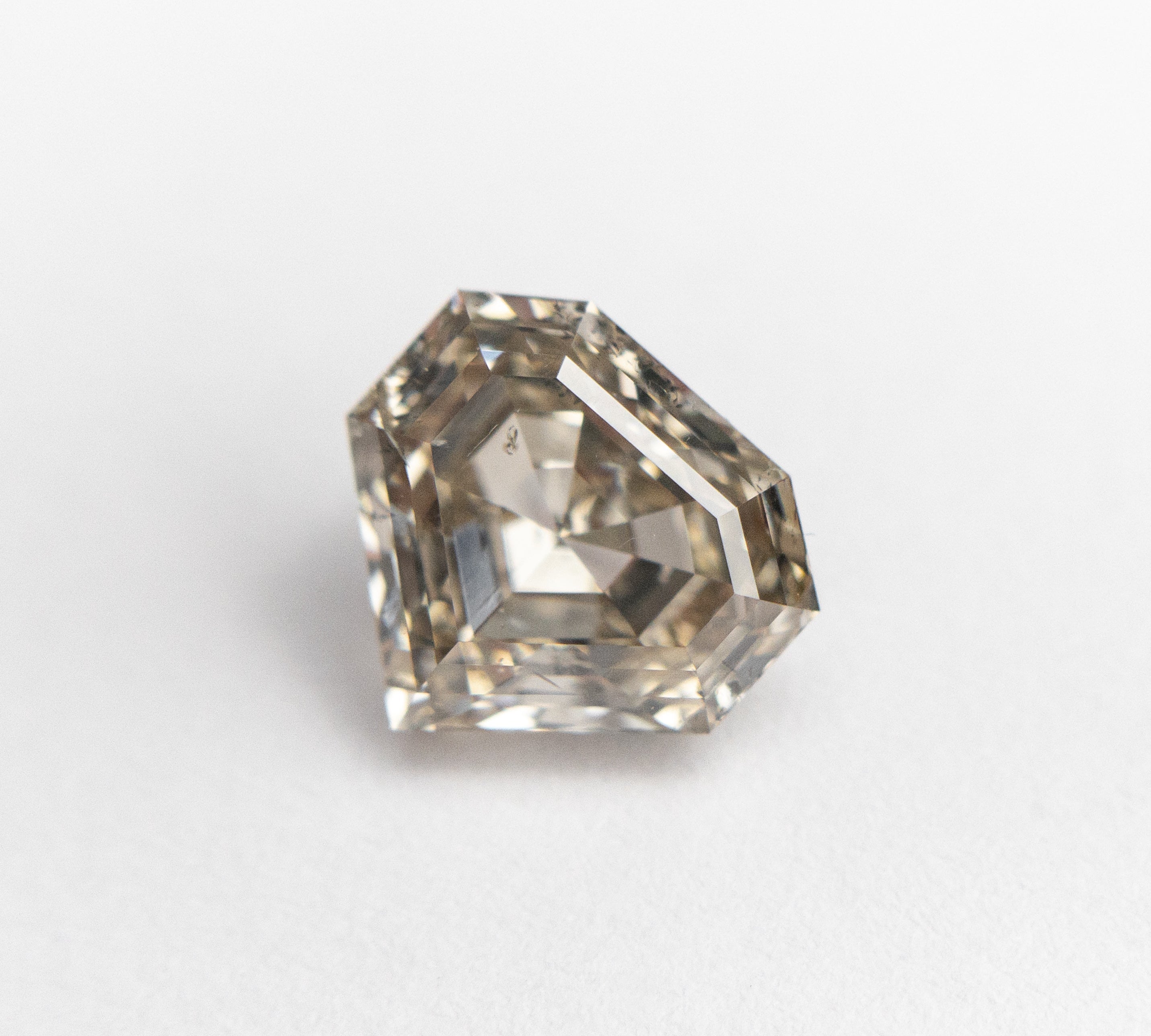 1.58ct 7.04x7.49x4.09mm I1 Shield Step Cut 19163-34 🇨🇦 - Misfit Diamonds