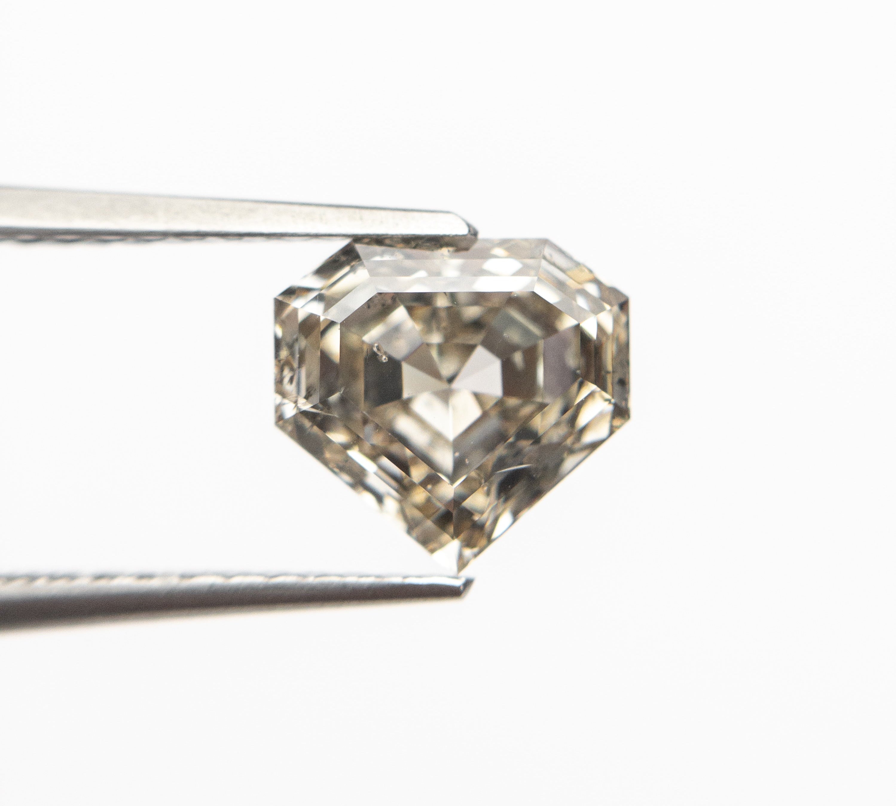 1.58ct 7.04x7.49x4.09mm I1 Shield Step Cut 19163-34 🇨🇦 - Misfit Diamonds
