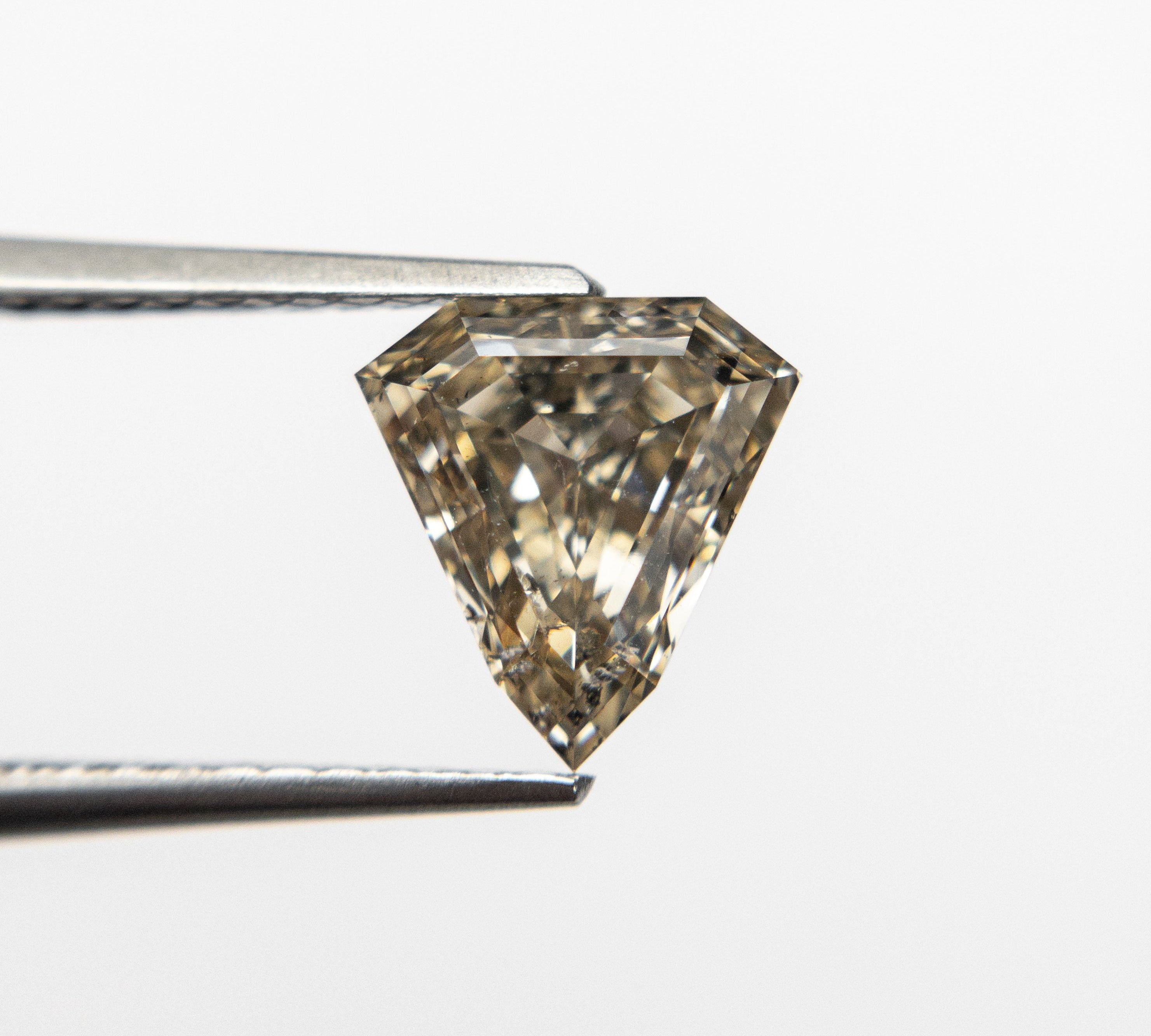 1.28ct 7.39x6.99x4.04mm I1 Shield Step Cut 19164-18 🇨🇦 - Misfit Diamonds