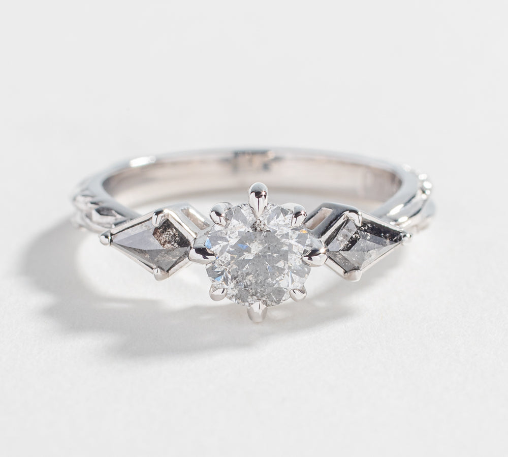 one of a kind engagement ring with salt and pepper diamonds round diamond kite shape alternative engagement
