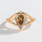 one of a kind engagement ring with solid gold medievel looking game of throne engagement ring with pear shape brown salt and pepper diamond by angela monaco jewelry