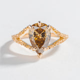 one of a kind engagement ring with solid gold medievel looking game of throne engagement ring with pear shape brown salt and pepper diamond by angela monaco jewelry