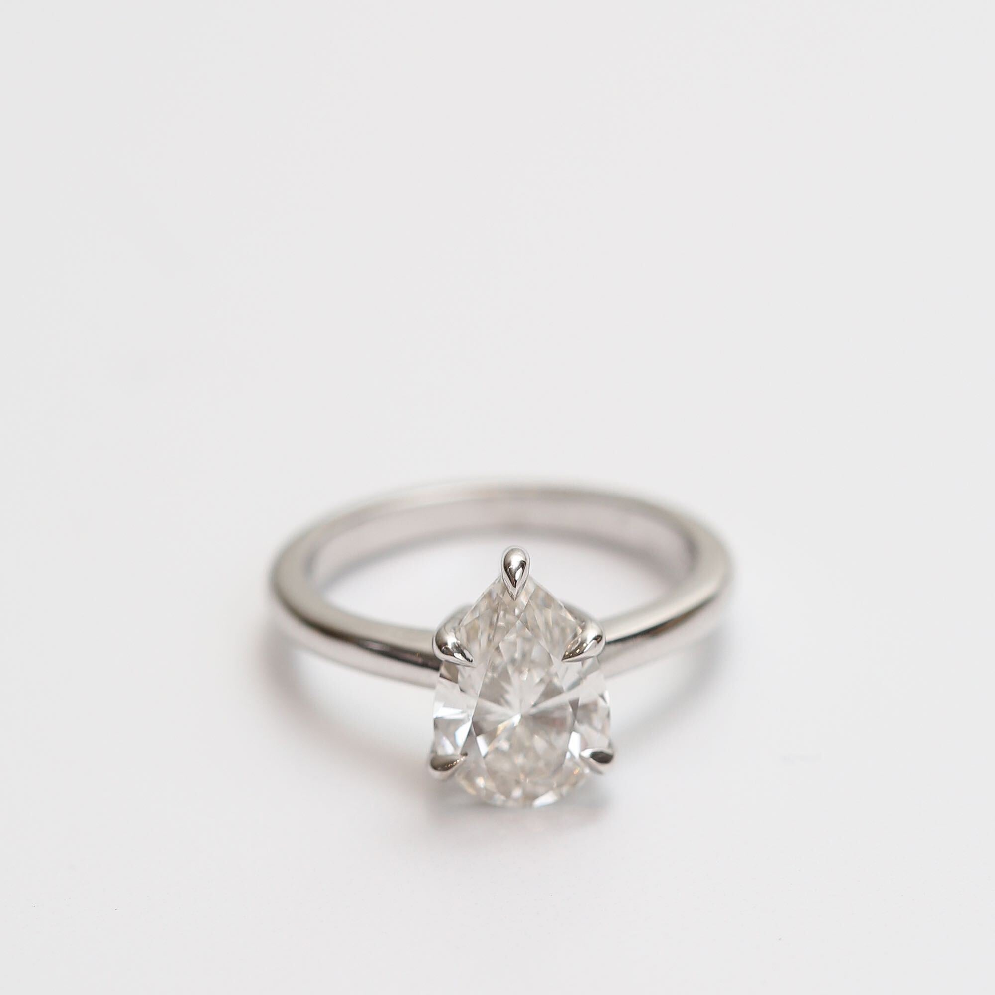 Angela Monaco Jewelry Philadelphia pear solitaire w4k white gold and lab created 2 carat diamond