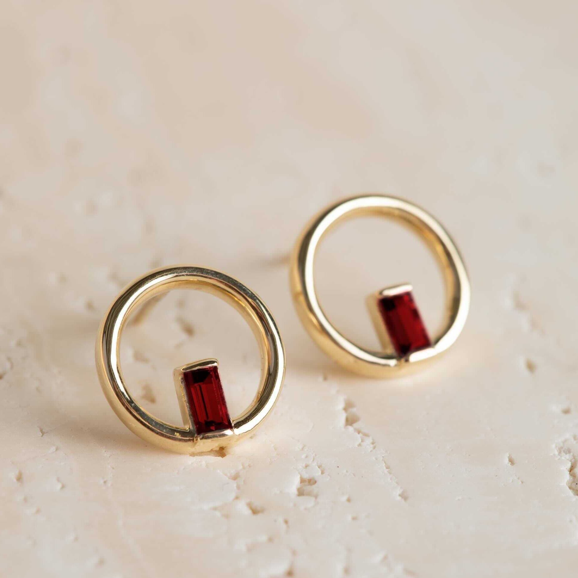 Angela Monaco Jewelry Philadelphia 14k yellow gold and garnet baguettes circle studs