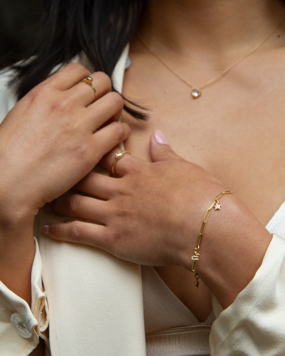 angela monaco jewelry philadelphia jeweler classic paperclip chain bracelet 14K yellow gold charms star sun snake
