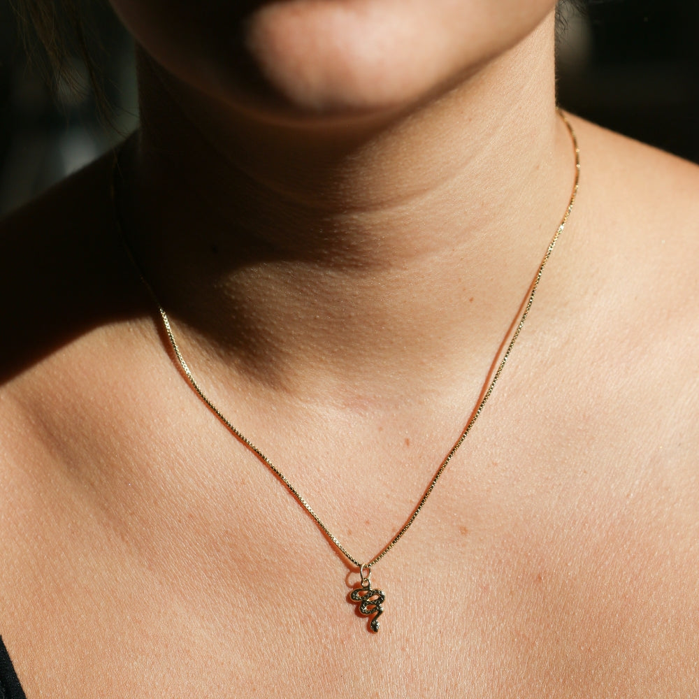 Angela Monaco Jewelry philadelphia 14k yellow gold white diamond snake charm